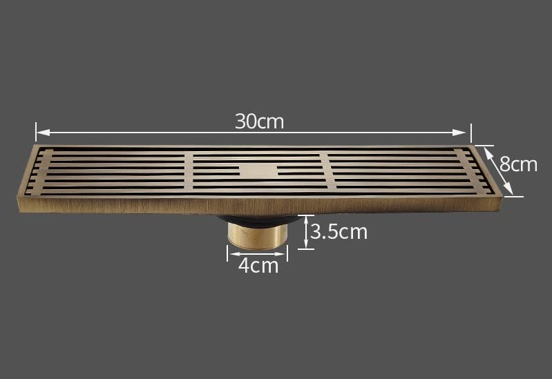 Linear floor drain underside showing 1.57-inch (40 mm) bottom outlet connection, brass construction