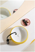 Bathroom vanity cabinet for vessel sink pairing with square ceramic yellow vessel basin on countertop