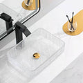 Sink with glass bowl on modern bathroom vanity, clear tempered glass rectangular vessel sink for small spaces