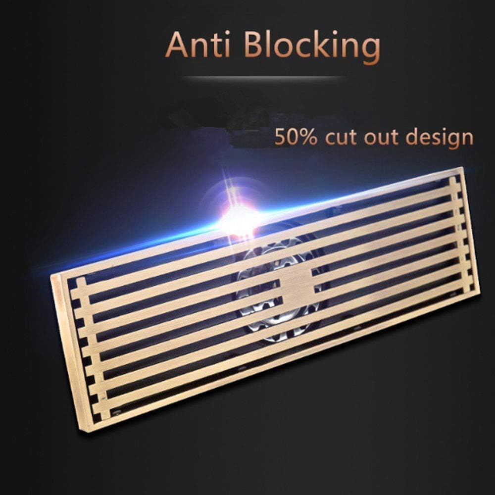 Flush floor-mounted rectangular shower floor drain installed look, antique brass slotted grate cover