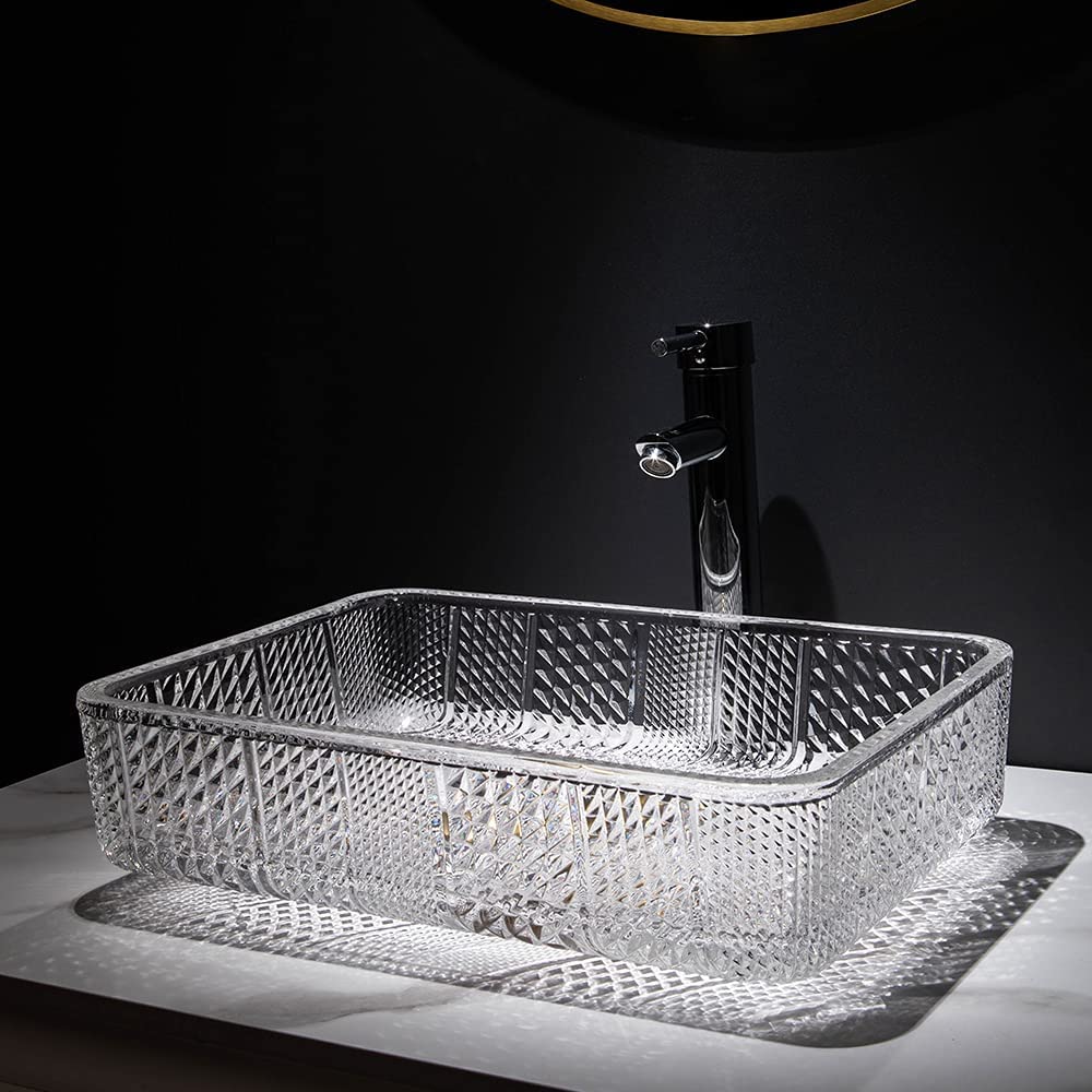 Close-up rim detail of InArt tempered glass vessel sink, glossy clear rectangular glass sink bowl