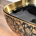 Table top sink ceramic oval bowl, black and gold glossy finish styled on countertop with faucet