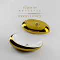 Vessel sink vanity angle view of oval ceramic vessel sink, glossy white with gold rim