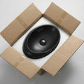 Modern vessel sink lifestyle on bathroom counter, InArt matte black rectangular ceramic wash basin