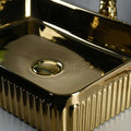 Lifestyle bathroom ceramic basin on vanity countertop for vessel sink, modern style rectangular rose gold sink
