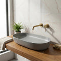 InArt bathroom countertop basin close-up, matte gray ceramic rectangular rim and smooth finish detail