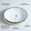 Bath vessel sink side angle view, oval ceramic above counter bathroom sink in white with gold rim