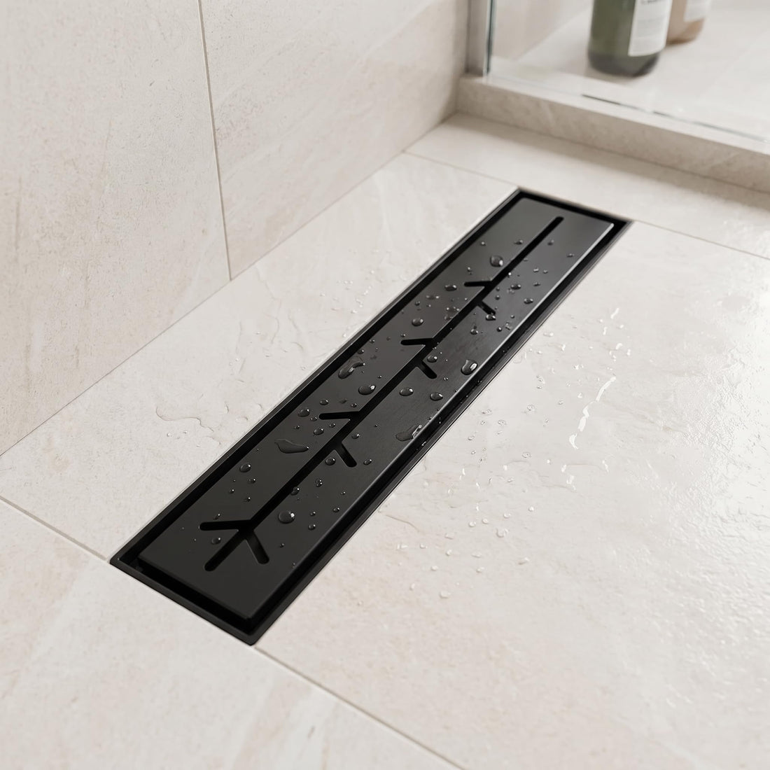 InArt matte black 12-inch linear shower drain with branch-slot grate