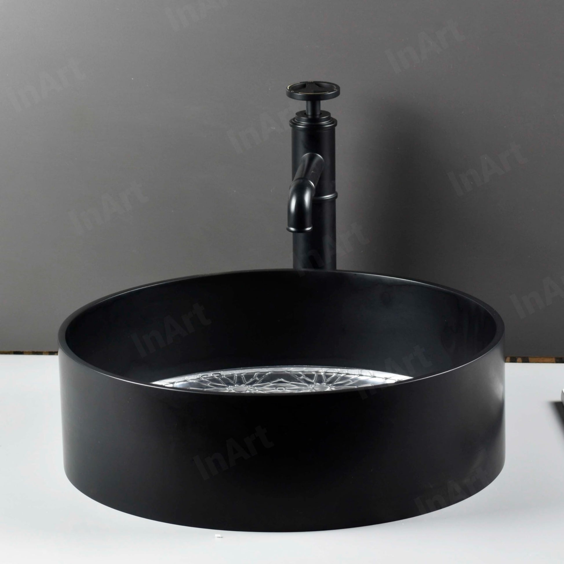 Modern countertop vessel sink basin, black-coated glass round shape with center drain opening, no overflow