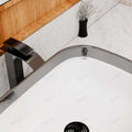 Rectangular sink bowl close-up, smooth glazed ceramic with silver white rim detail