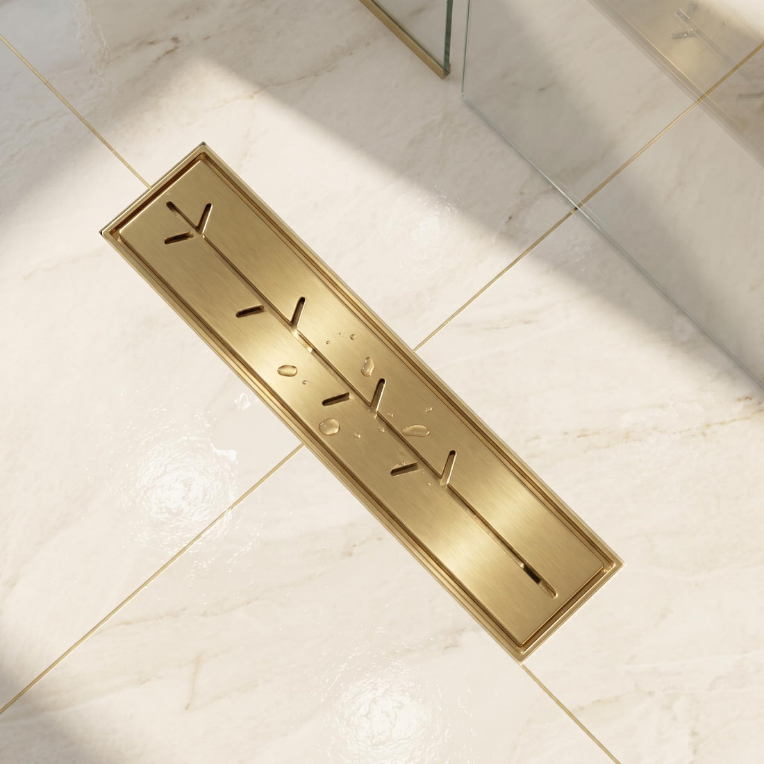 InArt brushed gold 12-inch linear shower drain with branch-slot grate