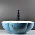 Contemporary vessel sink angled view, round glossy blue ceramic bowl basin for modern bathroom vanity