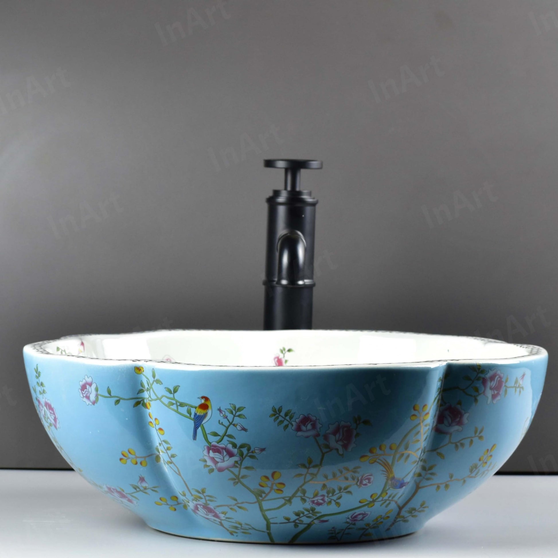 Contemporary vessel sink angled view, round glossy blue ceramic bowl basin for modern bathroom vanity