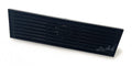 Angled view of brass linear shower drain body with removable matte black grate and center outlet