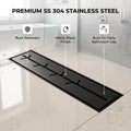 Slim matte black shower drain grate for a tiled bathroom floor