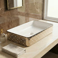 Gold vessel sink detail showing glossy ceramic finish on rectangular sink bowl, modern vessel sink style