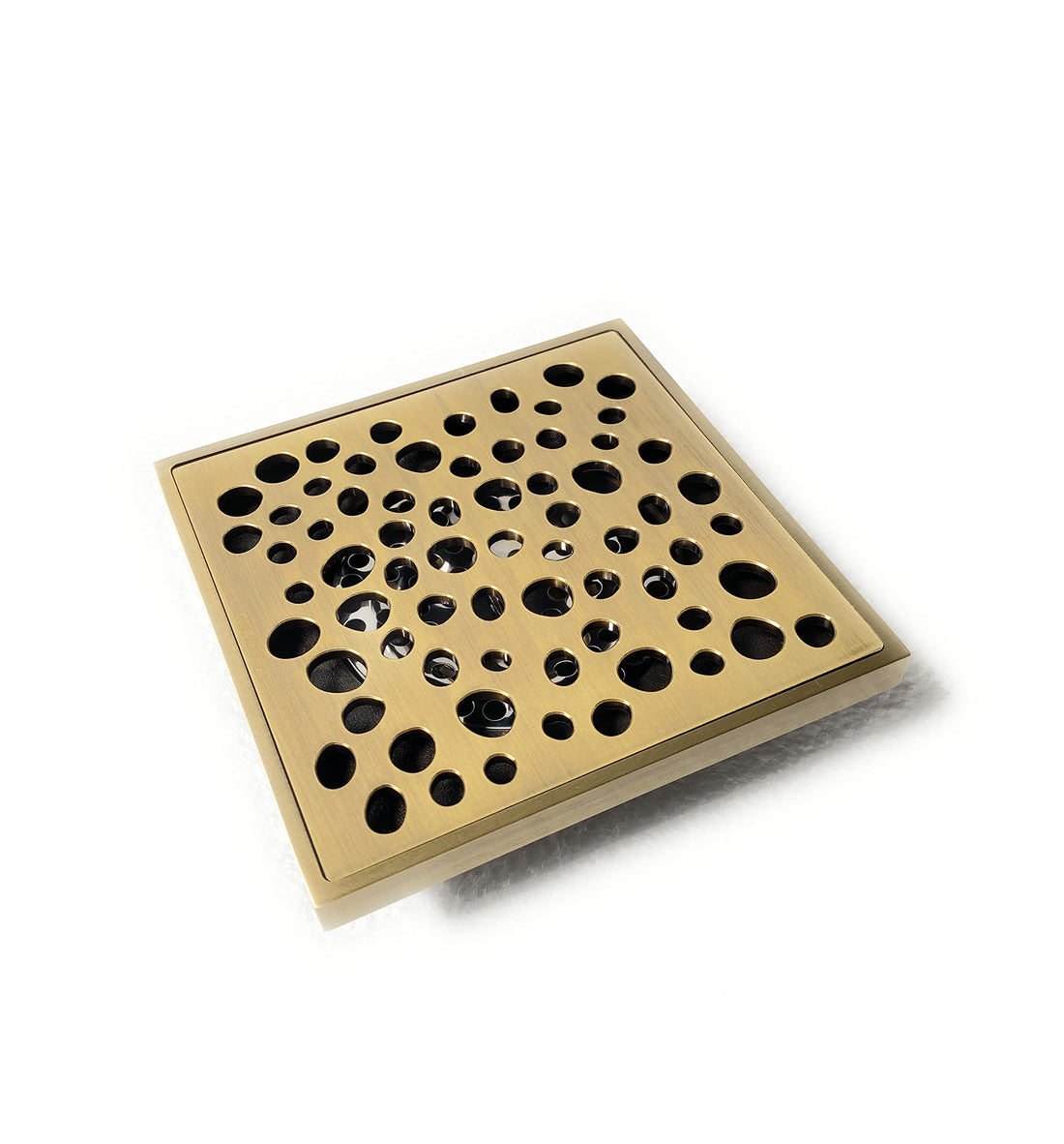 Square shower floor drain cover in antique brass, decorative round-hole brass grate