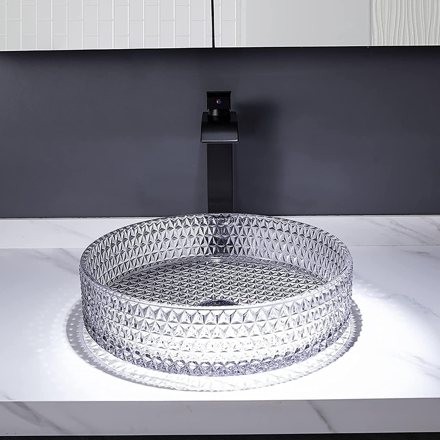 Bowl sink vanity detail showing round tempered glass vessel bowl with smooth glossy clear finish