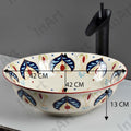 InArt ceramic vessel sink round bowl, beige blue art finish, angled view above-counter bathroom basin