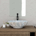 Bathroom vessel sink side angle view, round ceramic light blue glossy bowl sink for vanity