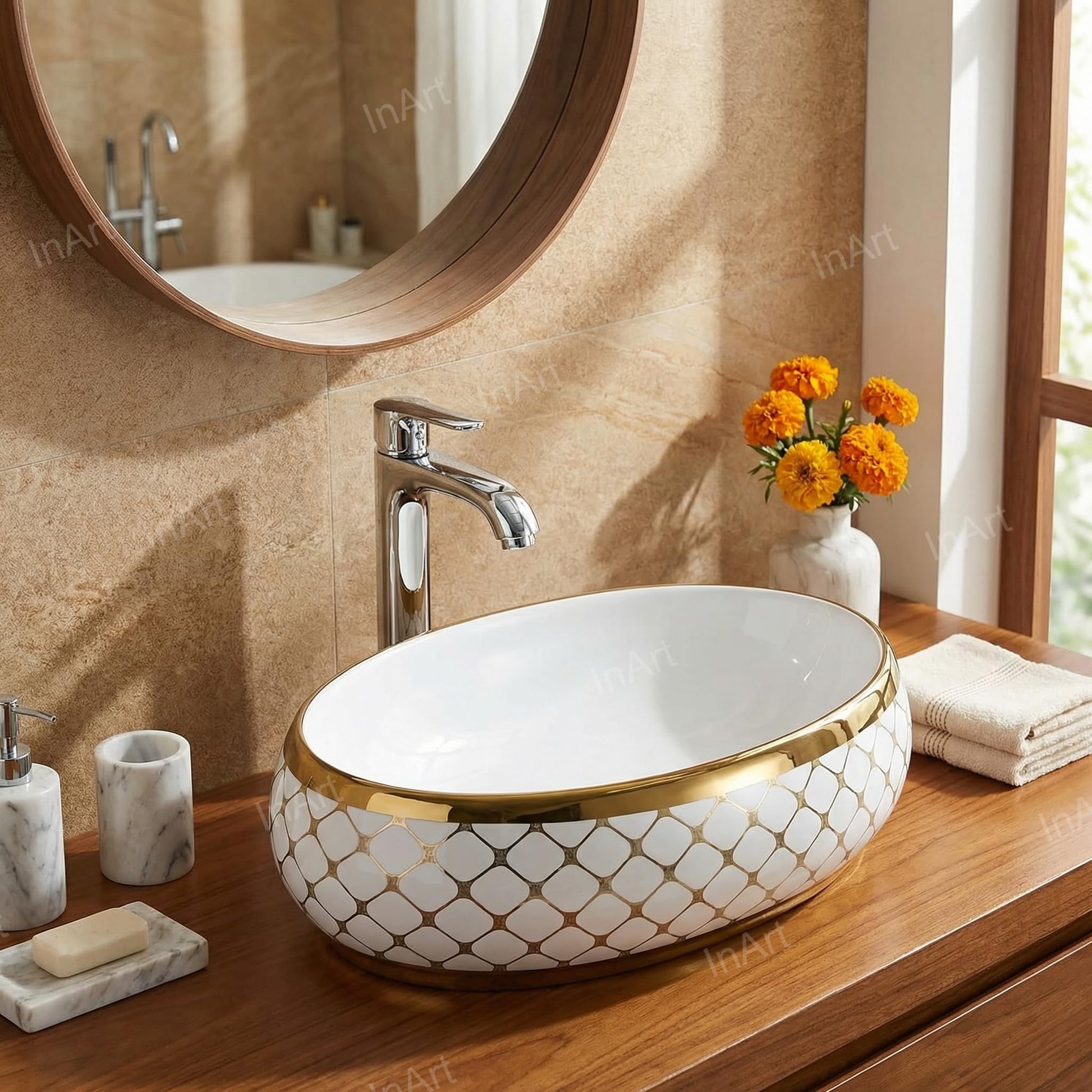 Close-up gold rim detail on white oval ceramic vessel bathroom sink, smooth glazed finish