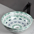 Close-up of glossy light blue ceramic basin, smooth round sink bowl with modern finish