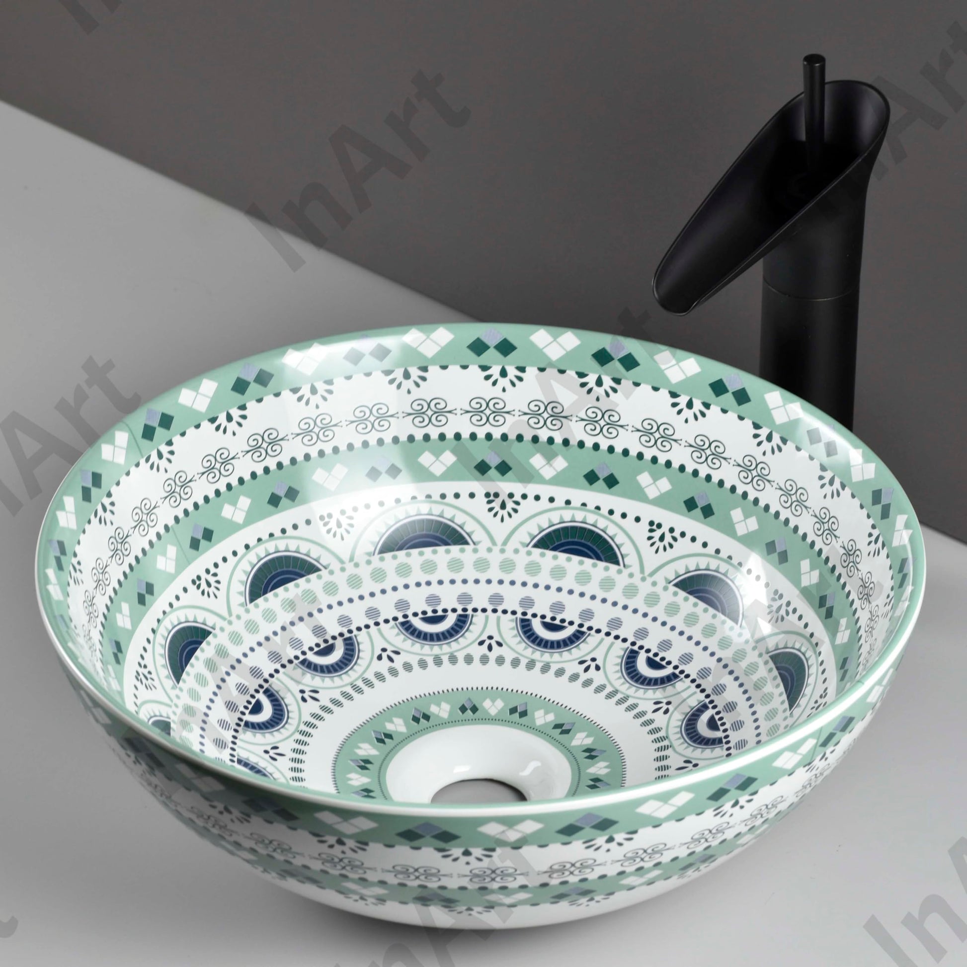 Close-up of glossy light blue ceramic basin, smooth round sink bowl with modern finish