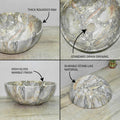 Vessel sink on vanity angled view of InArt round ceramic vessel bowl sink, green marble glossy