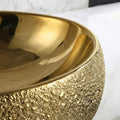 Lifestyle on bathroom vanity with vessel sink, InArt oval ceramic gold above counter bathroom sink bowl