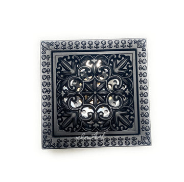 InArt 4 inch brass square shower floor drain cover installed in tile shower floor