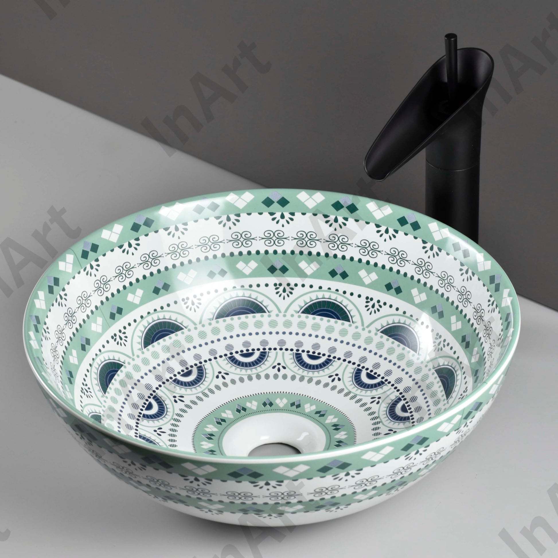 Lifestyle bathroom vanity setup with modern sink, round ceramic vessel sink in light blue