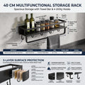 Matte black aluminum kitchen shelf holding spice jars and bottles
