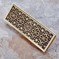 Antique brass brass linear shower drain strainer with decorative lattice grate, 12 x 4 in