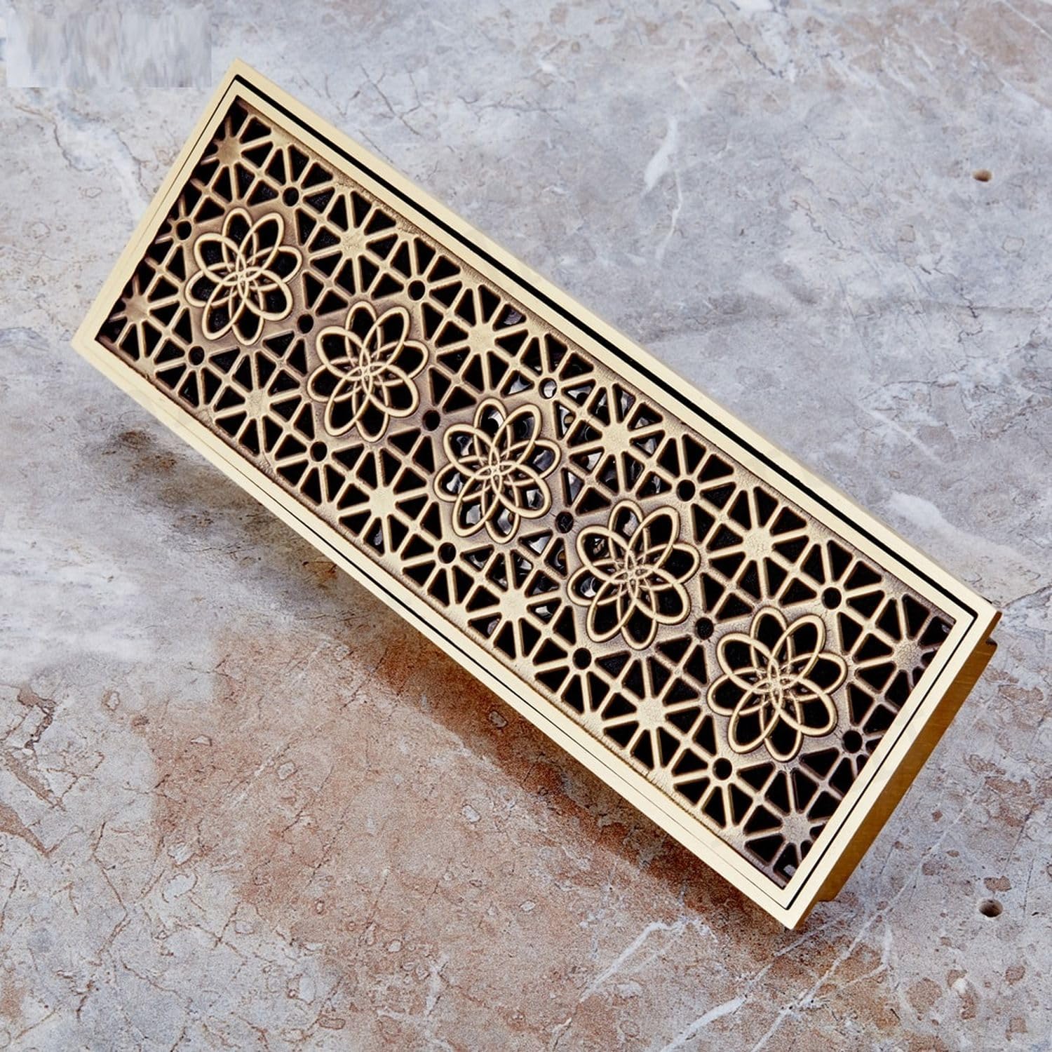 Antique brass brass linear shower drain strainer with decorative lattice grate, 12 x 4 in