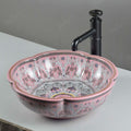 Glossy pink ceramic oval bathroom vessel sink on vanity, InArt tabletop basin bowl side angle view