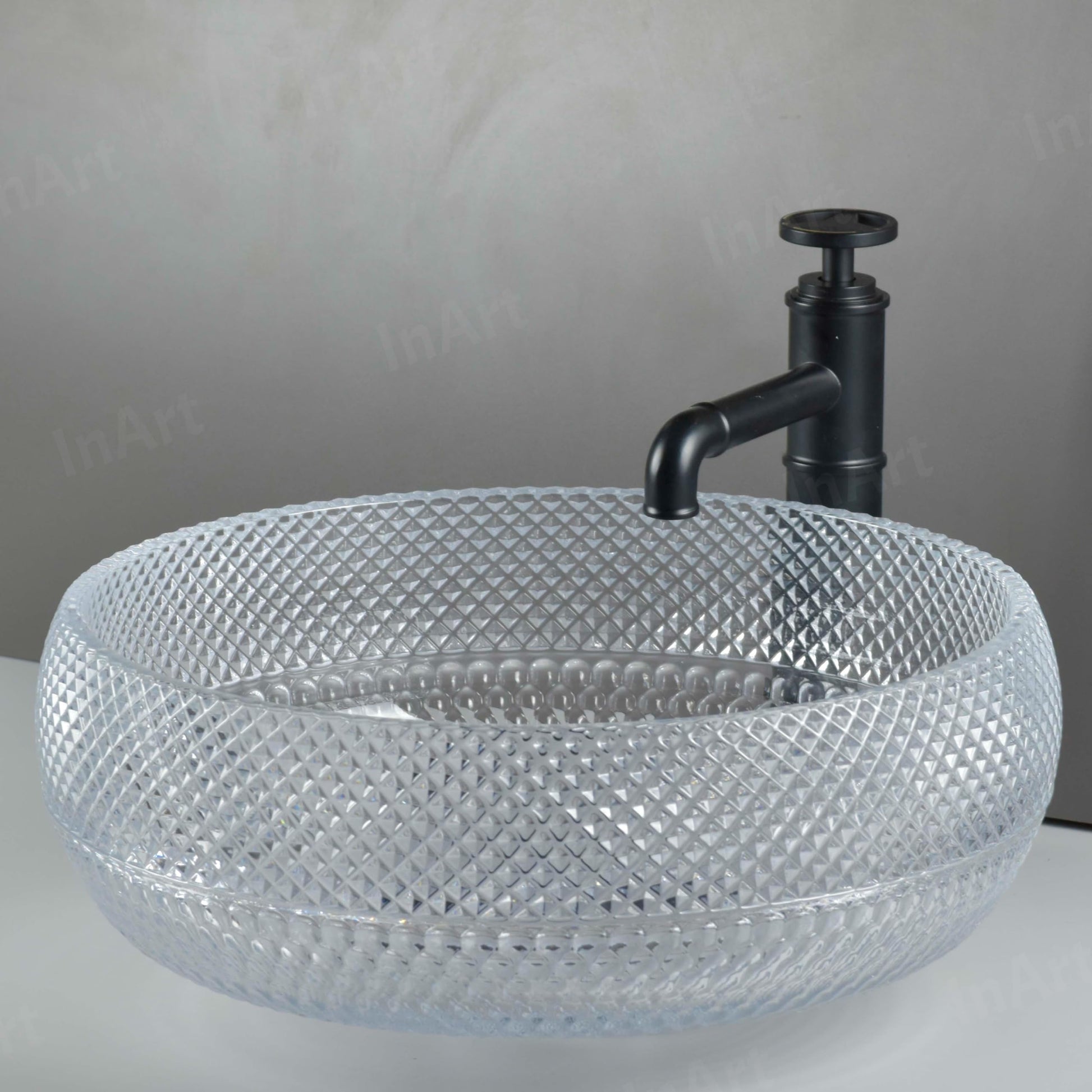 Lifestyle on modern bathroom counter: InArt glass bowl sink vanity, clear square tempered glass vessel sink
