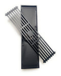 Matte black brass linear shower floor drain with slotted grate cover, rectangular center outlet