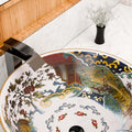 Close-up of multicolor Moroccan-style pattern on round ceramic vessel sink for bathroom vanity tops